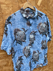 Vintage 90s light blue brown desert island scene tropical hibiscus palm tree Hawaiian rayon shirt si