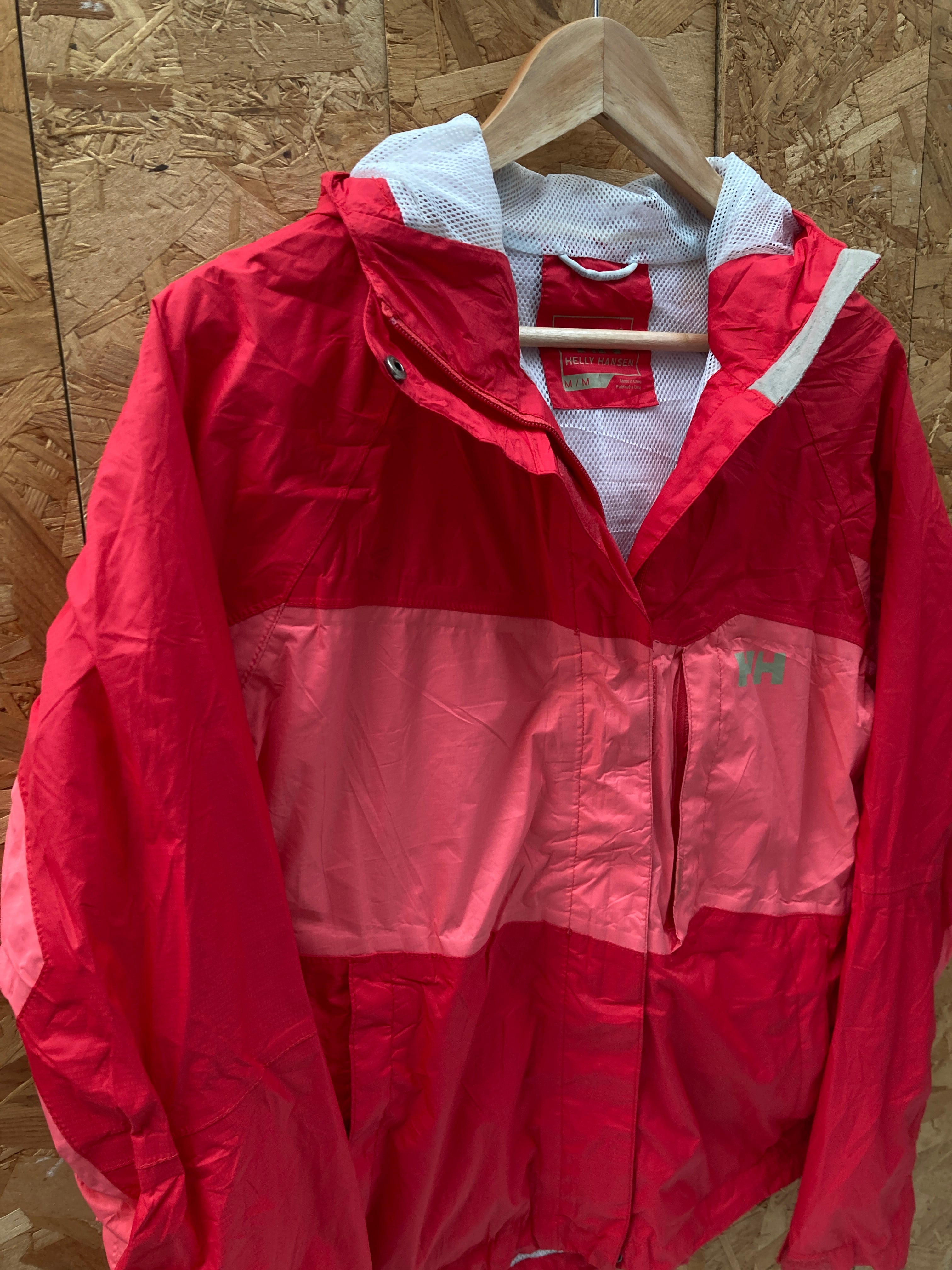 Vintage Y2K red pink waterproof technical jacket by Helly Hansen size medium