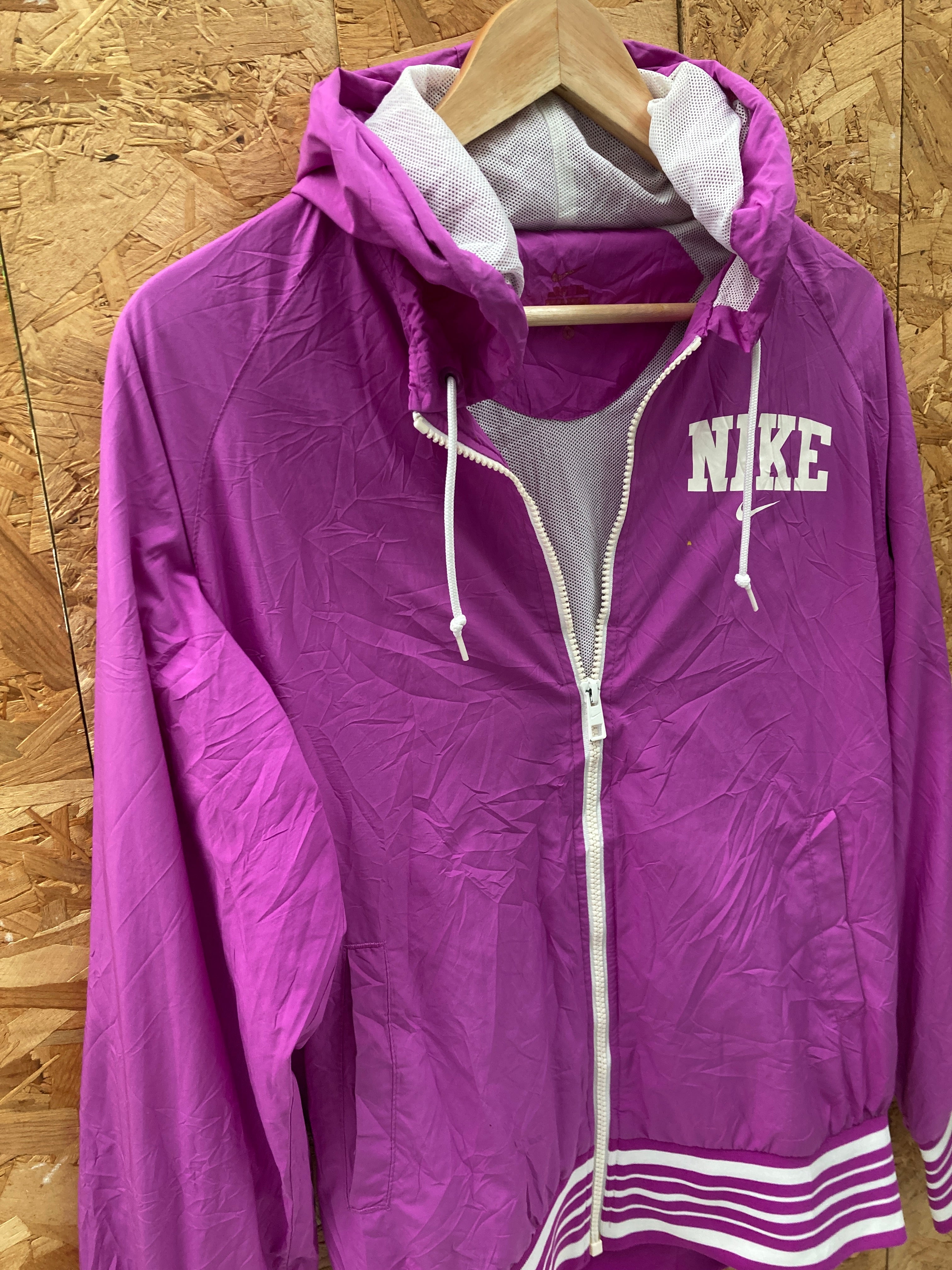Vintage Y2K bright fuschia pink varsity style shell jacket size medium by Nike