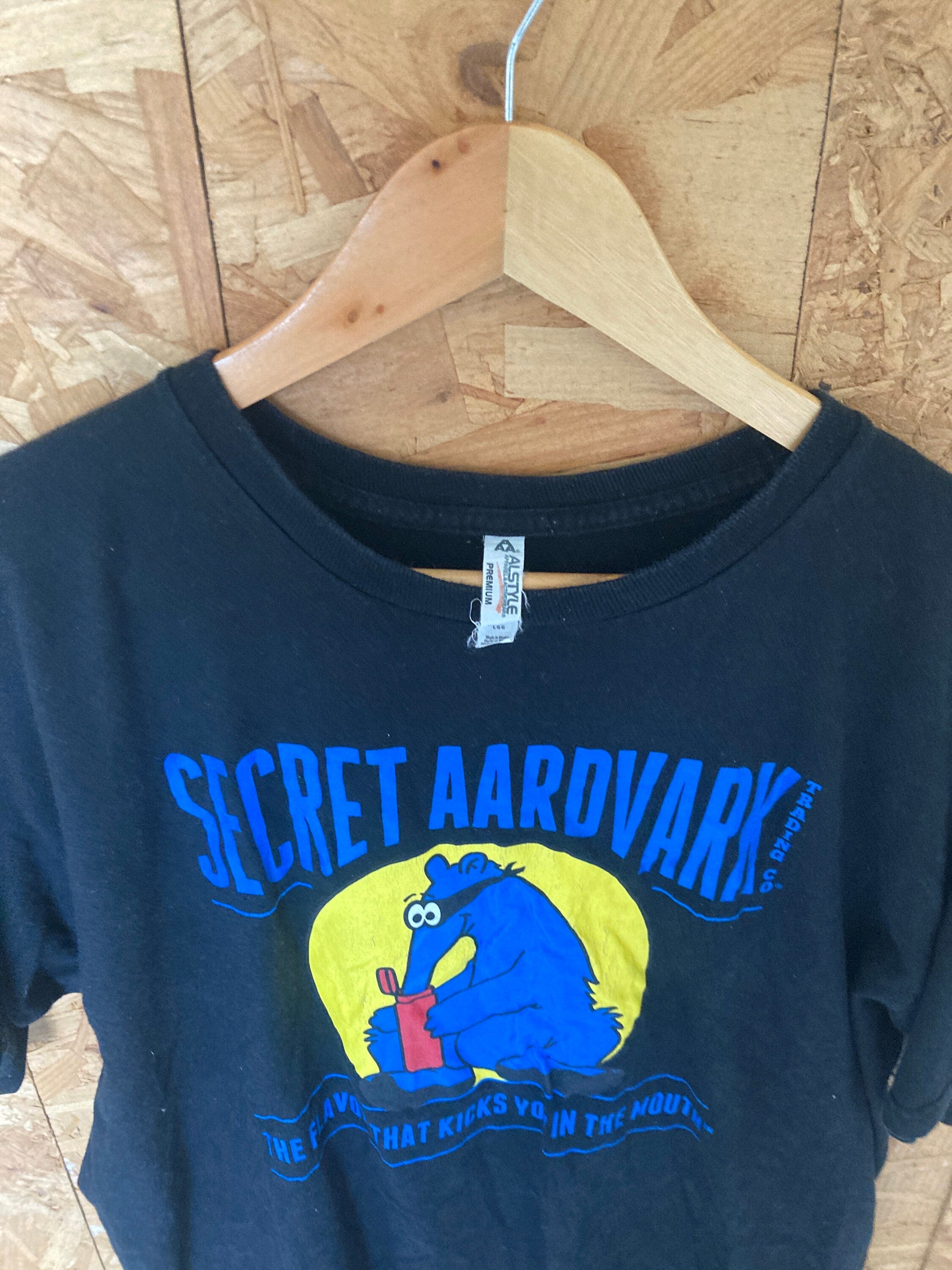 Vintage 90s Secret Ardvark trading co USA souvenir black t shirt size large