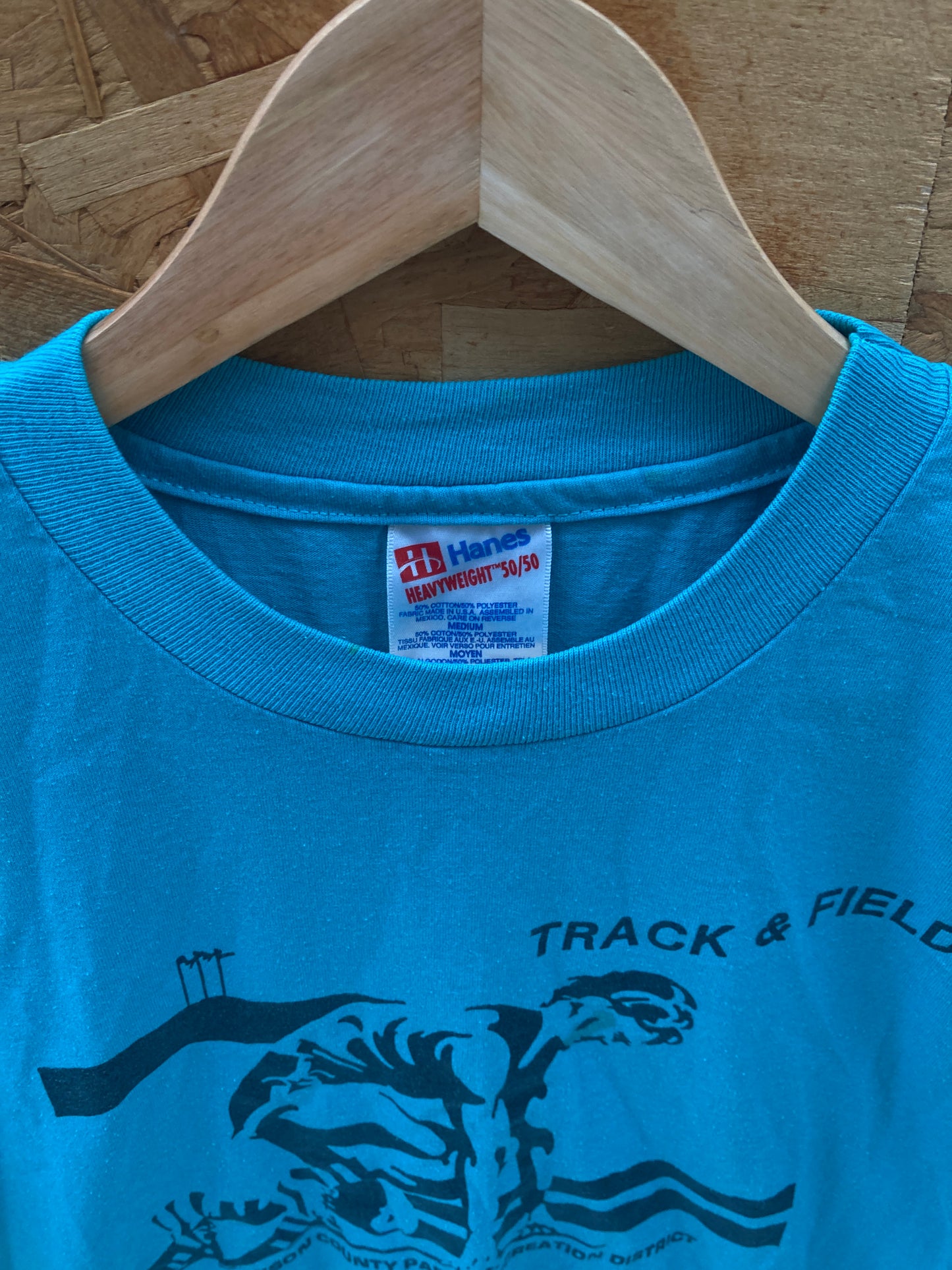 Vintage 90s Johnson County Track & Field turquoise single stitch t-shirt size M