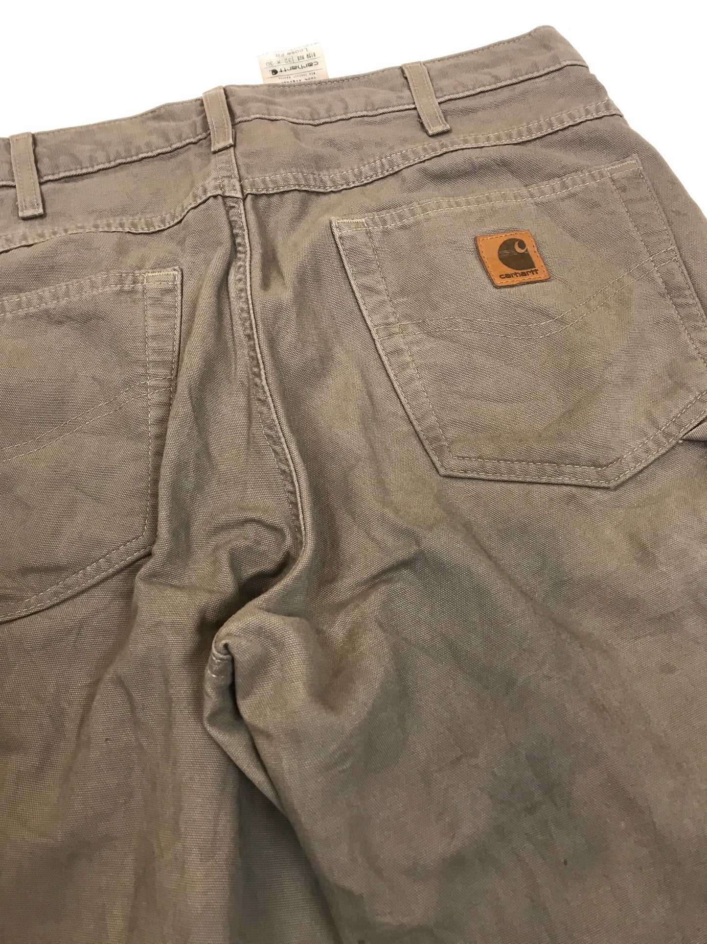 Vintage 90s distressed worn Carhartt light beige grey heavy cotton canvas duck weave workwear carpenter pants