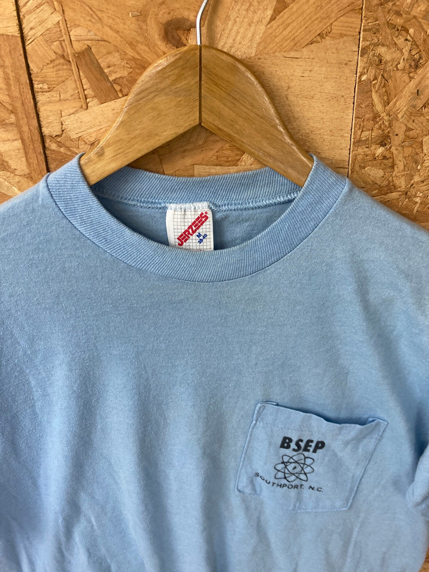 Vintage 80s Quirky Brunswick Pipe Replacement BSEP pocket souvenir USA pastel light blue t-shirt size medium