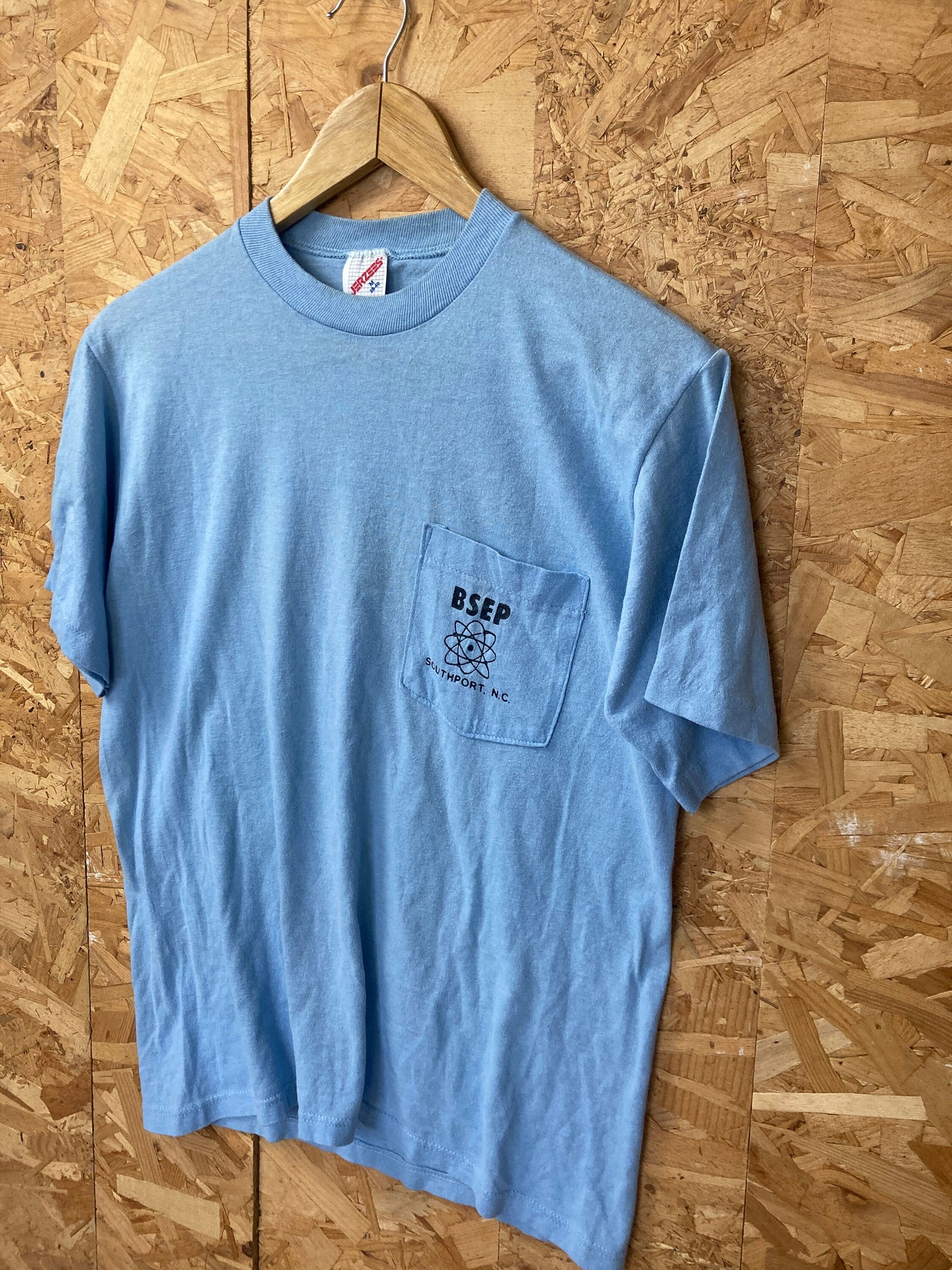 Vintage 80s Quirky Brunswick Pipe Replacement BSEP pocket souvenir USA pastel light blue t-shirt size medium