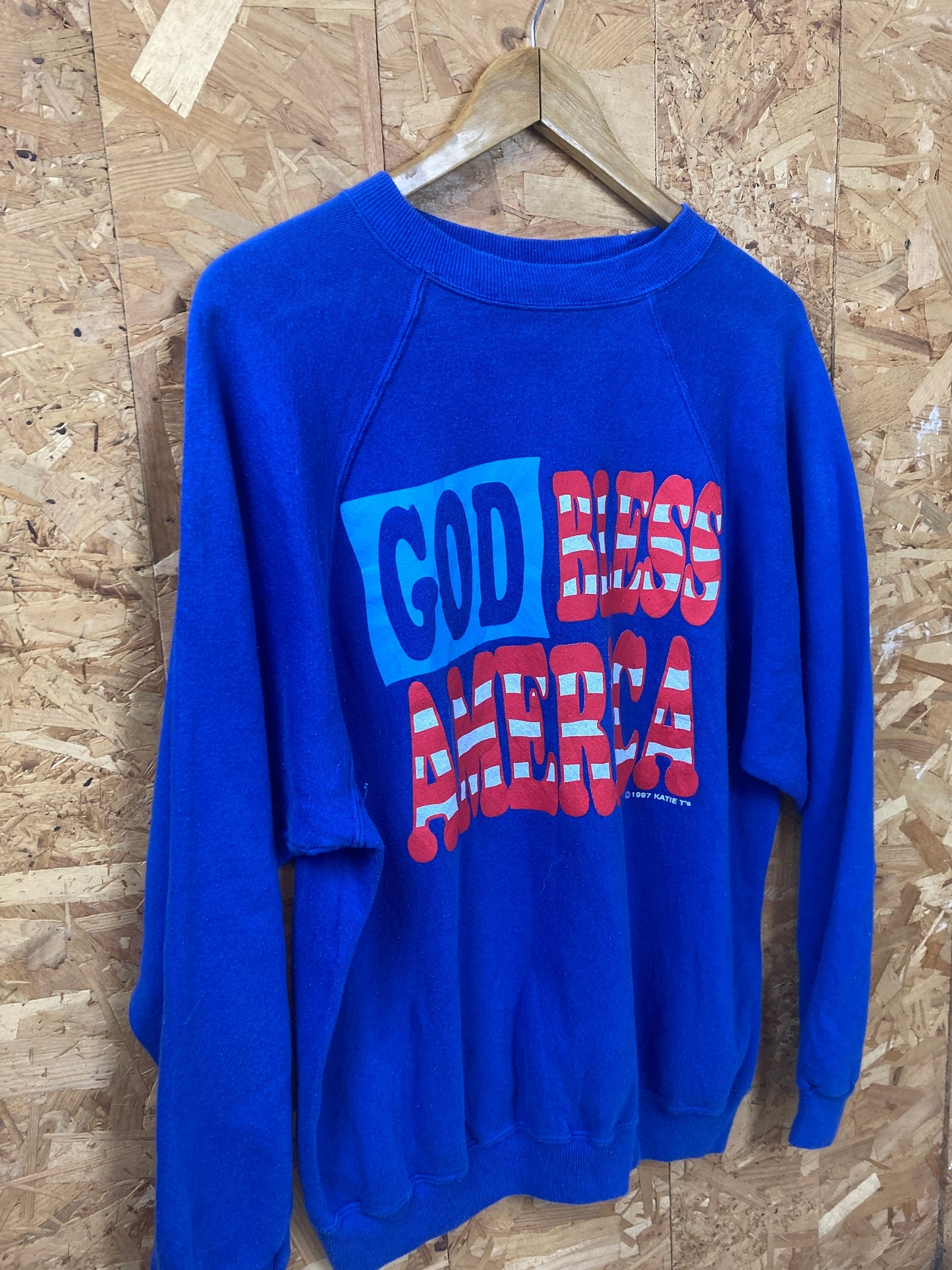 Vintage 90s God Bless America USA souvenir blue crew neck sweater size large