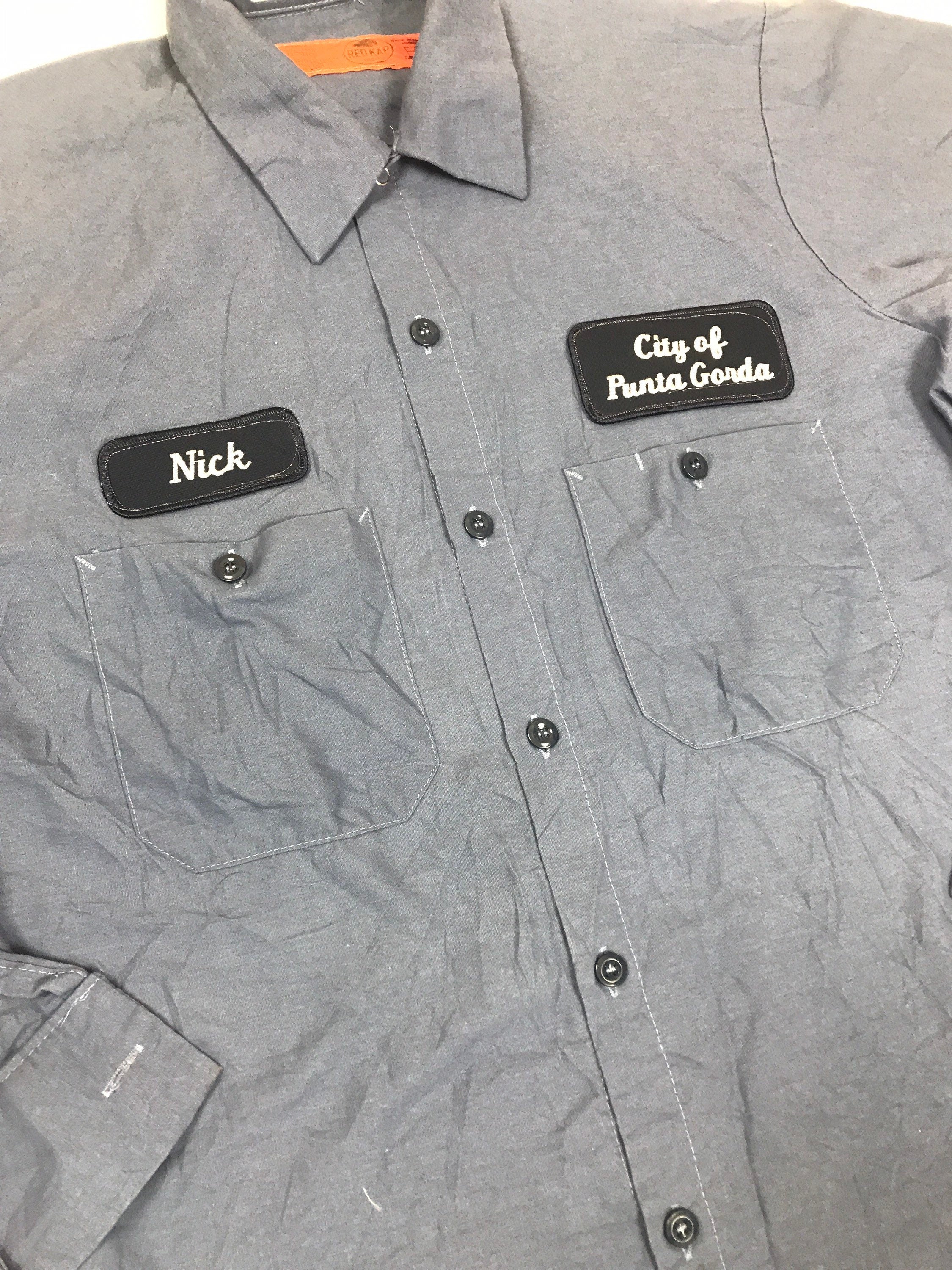 Vintage 80s USA distressed blue chore workwear workers shirt Nick city of punta gorda name badge By Redkap size medium