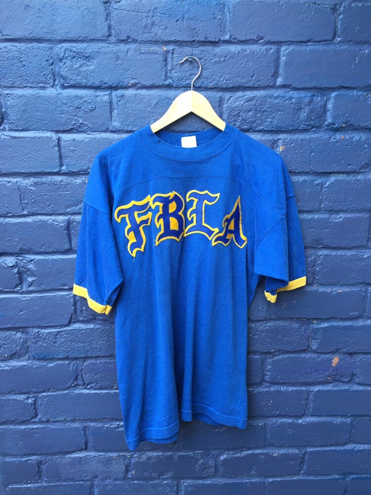 Vintage 90s FBLA embroidered letters USA souvenir American football yellow blue t-shirt size XL