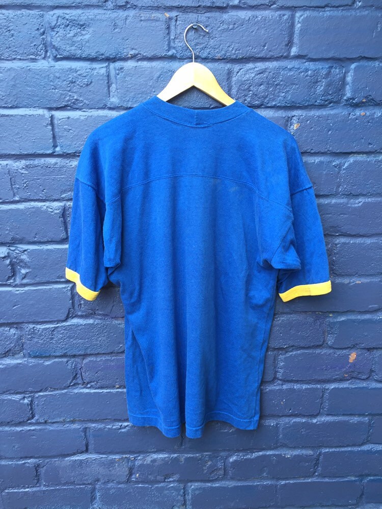 Vintage 90s FBLA embroidered letters USA souvenir American football yellow blue t-shirt size XL