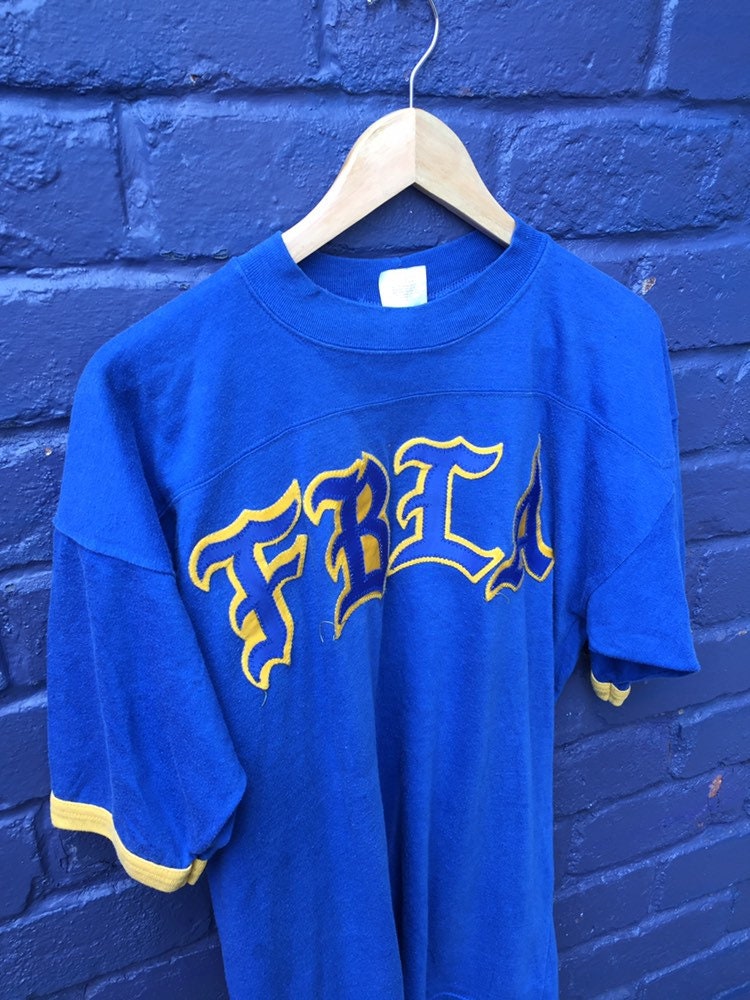 Vintage 90s FBLA embroidered letters USA souvenir American football yellow blue t-shirt size XL