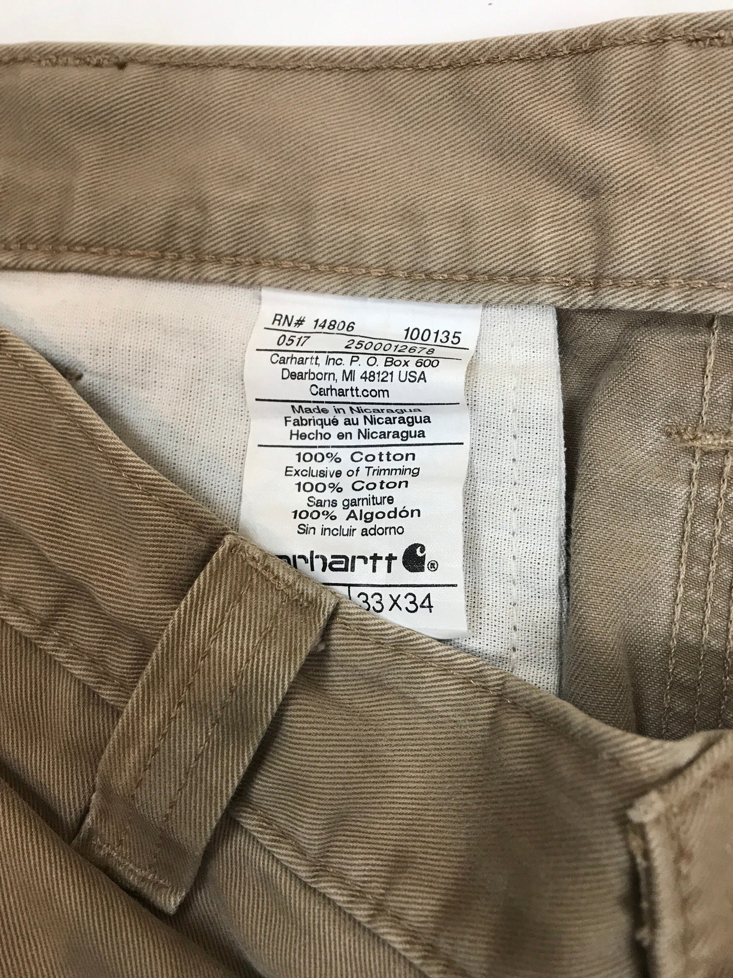 Vintage 00s distressed worn Carhartt light beige chino workwear carpenter pants trousers W33 L34